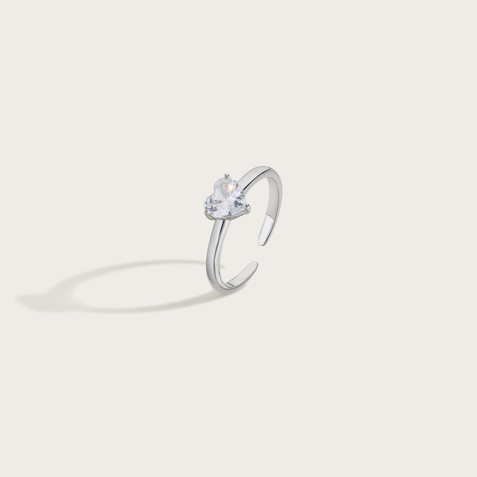Silver ring with a heart-shaped gemstone from unstoppable collective