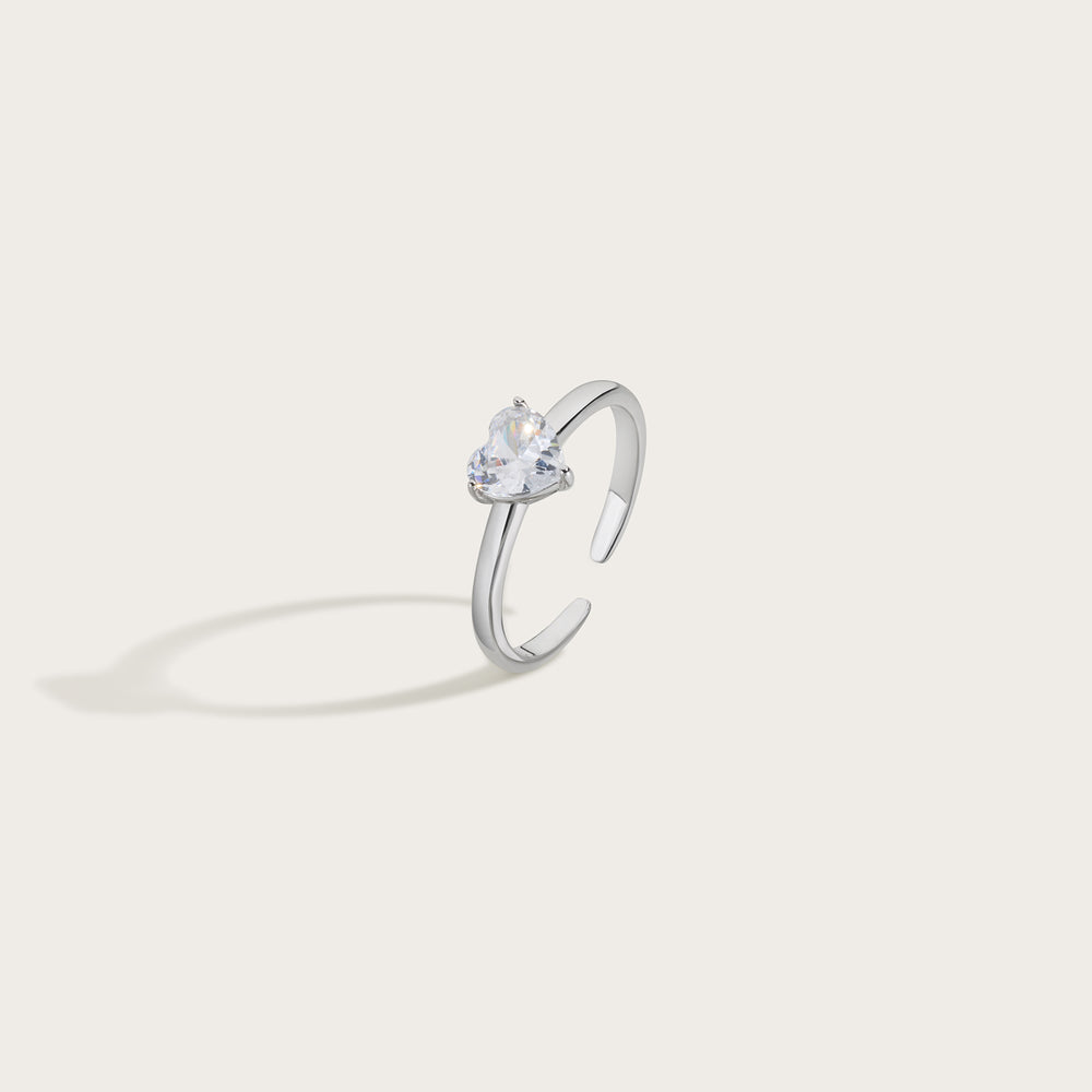 Silver ring with a heart-shaped gemstone from unstoppable collective