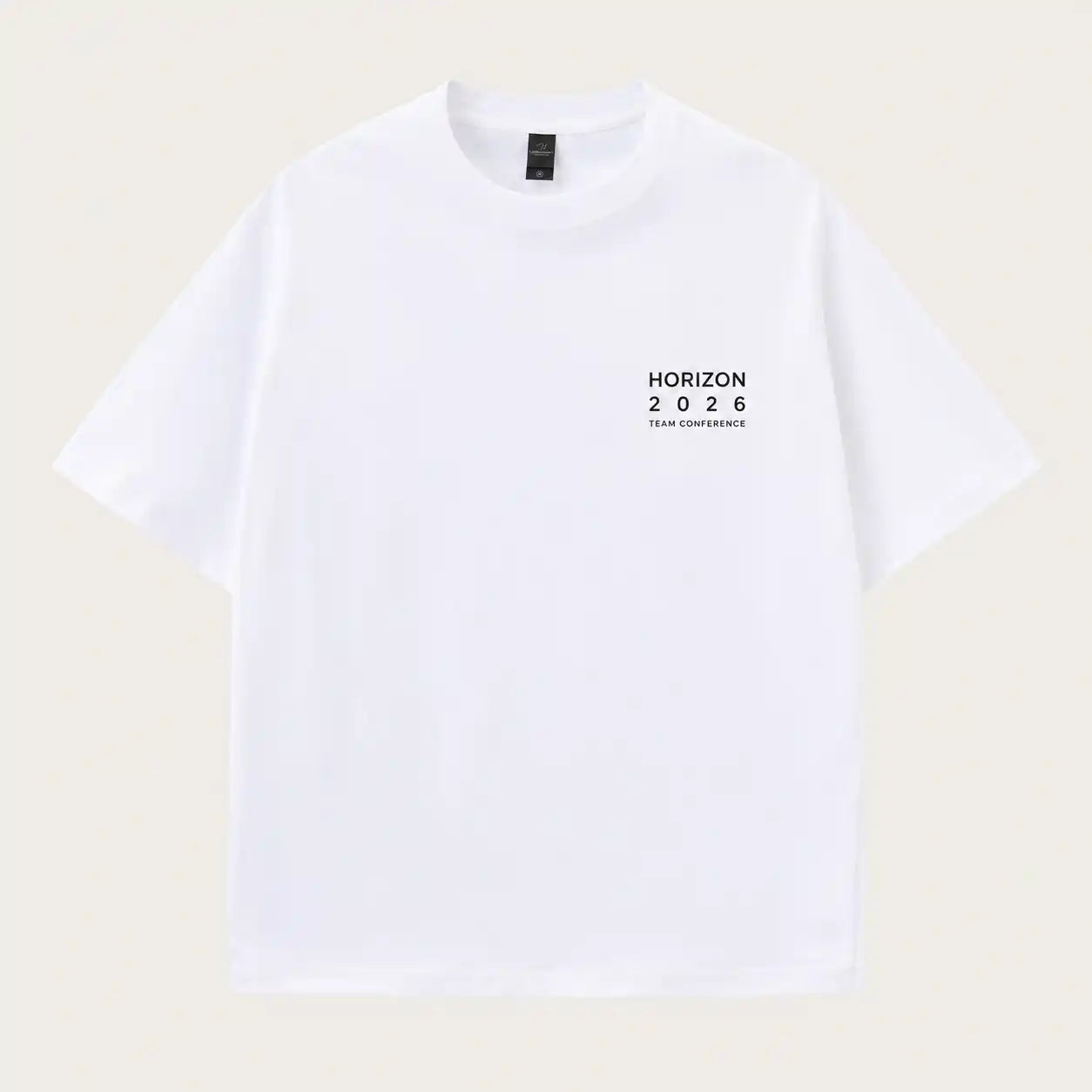 A white short-sleeve crewneck t-shirt with a small black graphic on the left chest reading 'HORIZON 2026 TEAM CONFIDENCE', displayed flat against a light beige background.